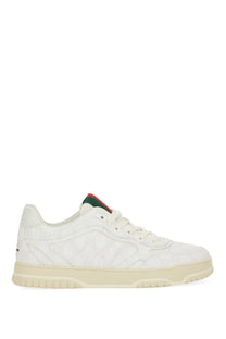 White gucci mens re web sneaker with textured upper green and red heel tab and cream rubber sole back view