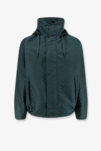 Gucci men’s dark green hooded jacket with subtle textured pattern and front button closure in ripstop cotton