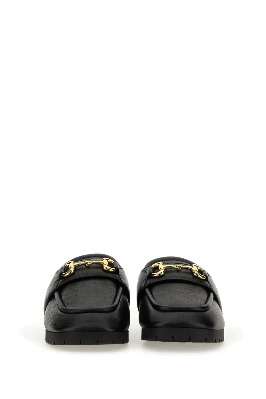 Black leather Gucci men’s sabot loafers with gold-tone horsebit buckles