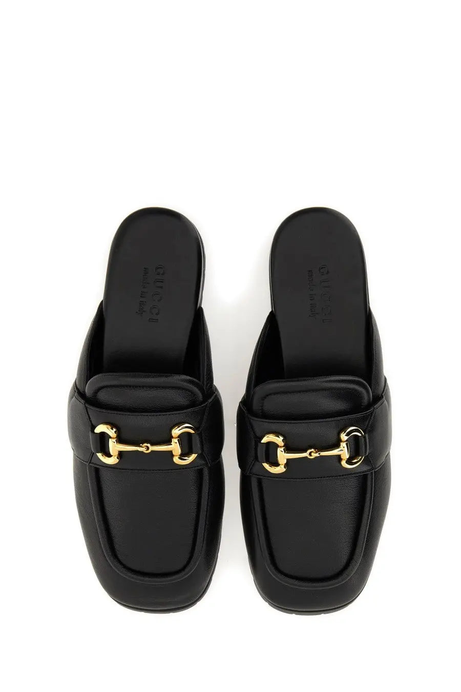 Black gucci men’s sabot mules with gold-tone horsebit detailing in leather for stylish casual wear