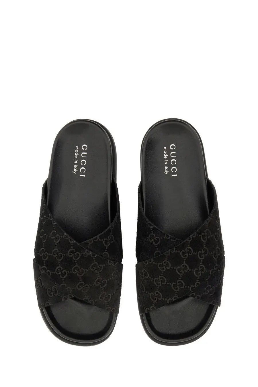 Black Gucci men’s slide sandals with signature GG monogram suede upper and sleek minimalist design multicolor accents