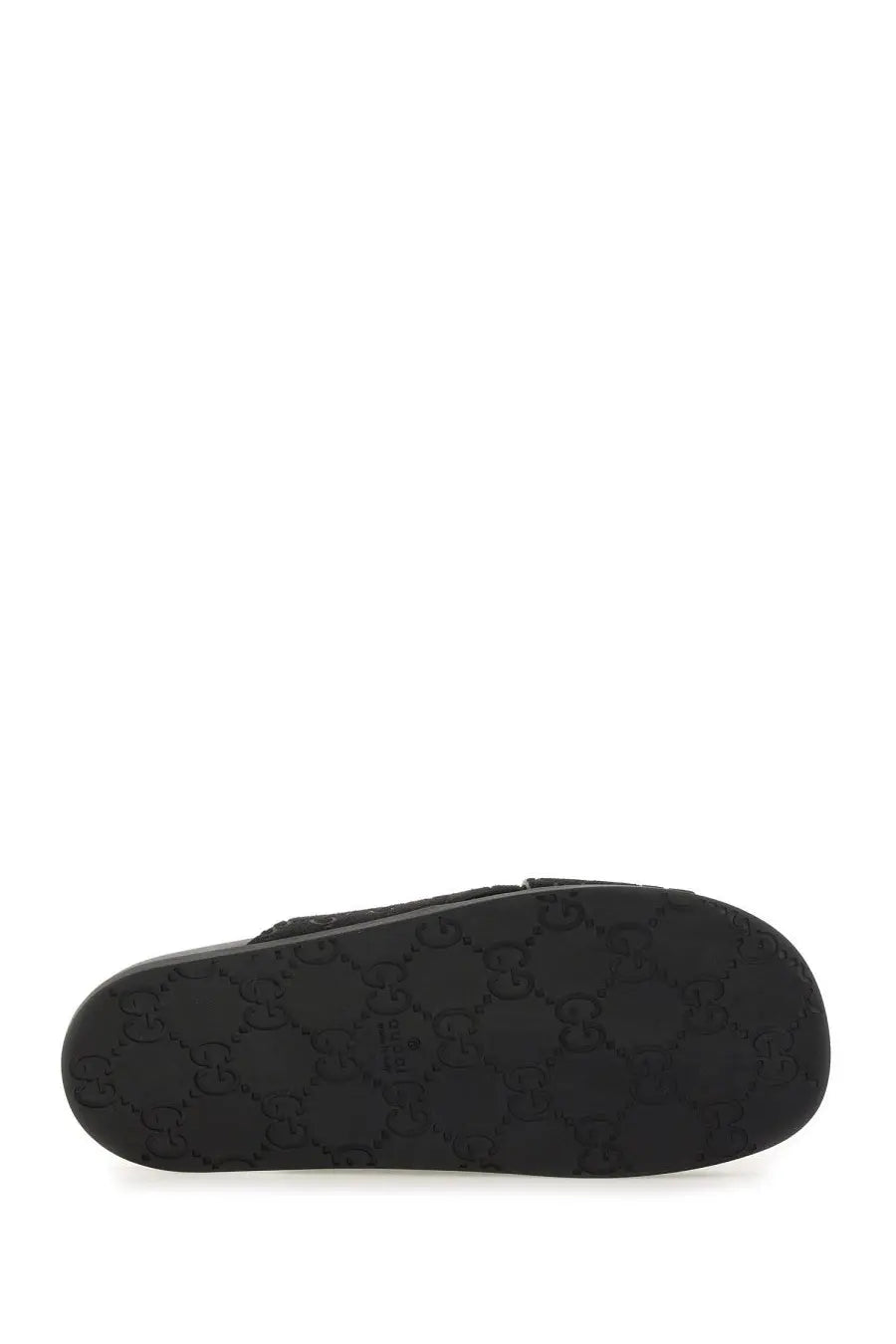 Black Gucci men’s sandal slider with textured sole featuring signature interlocking G pattern multicolor design