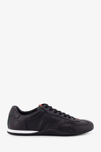 Black gucci men’s shift leather sneakers with sleek upper and green red details on heel tab and tongue