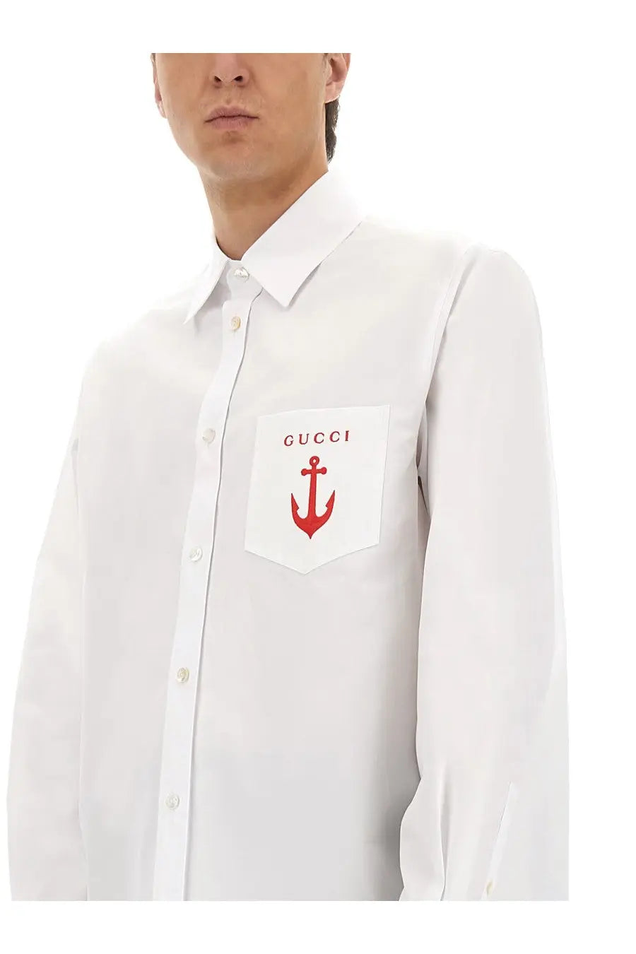 Gucci men’s white shirt with red embroidered logo and anchor patch for a stylish casual look