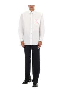 White Gucci men’s long-sleeved button-down shirt with red anchor emblem on left chest pocket