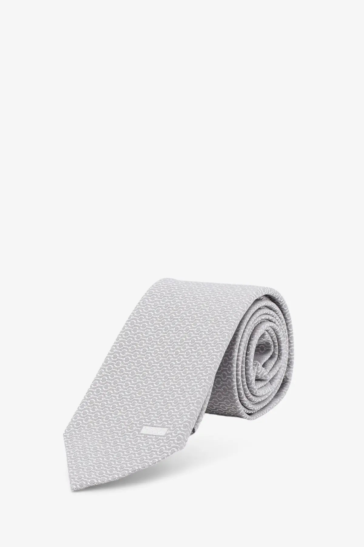 Gucci men’s silk tie white in light gray with a subtle repeating pattern and modern sleek design