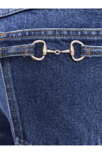 Silver horsebit buckle detail on blue denim gucci men’s slim five pocket jeans front side