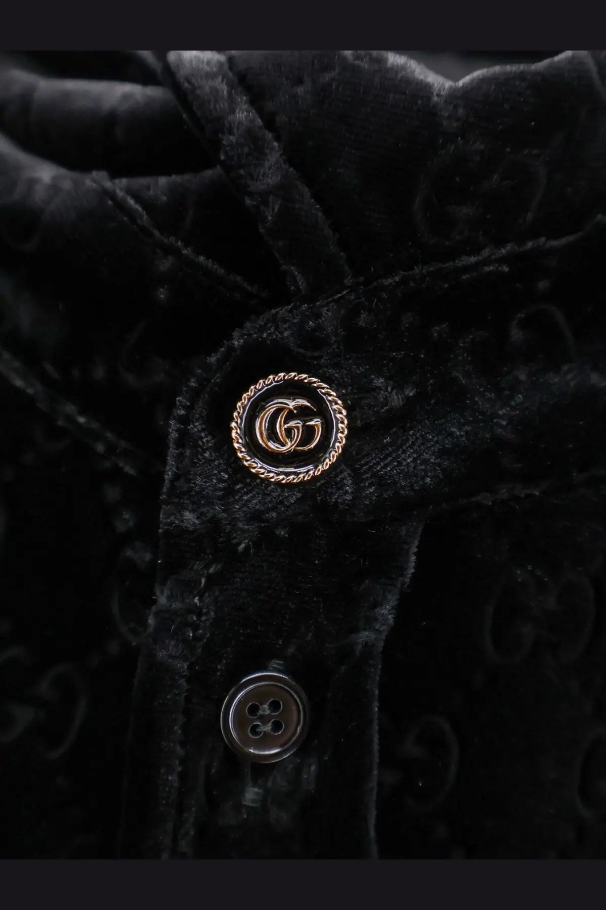 Gucci men’s black stretch velvet jacket with gold-tone Gucci double g logo button enhancing luxury style