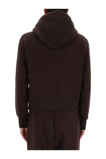 Dark brown Gucci men’s hooded sweatshirt showing the back with a subtle logo on the back pocket