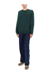 Green gucci men’s sweatshirt with subtle embroidered logo on chest made from soft fabric for casual wear