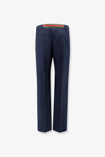 Gucci men’s technical panama navy blue trousers with a distinctive red and green striped waistband