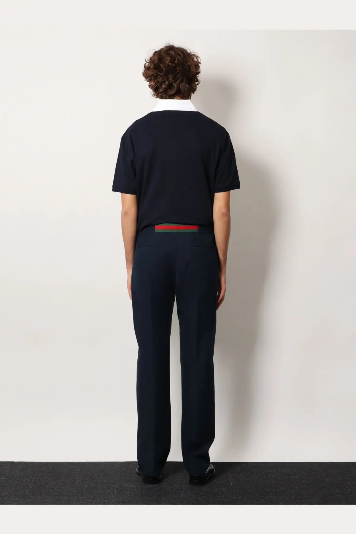 Navy blue short-sleeved polo shirt with white collar and red and green striped belt detail by Gucci Mens Technical Panama Trousers Black