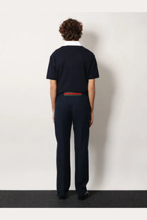 Navy blue short-sleeved polo shirt with white collar and red and green striped belt detail by Gucci Mens Technical Panama Trousers Black