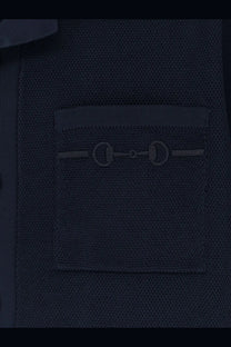 Dark navy knit jacket with subtle horsebit detail on chest pocket paired with gucci mens viscose blend polo shirt blue