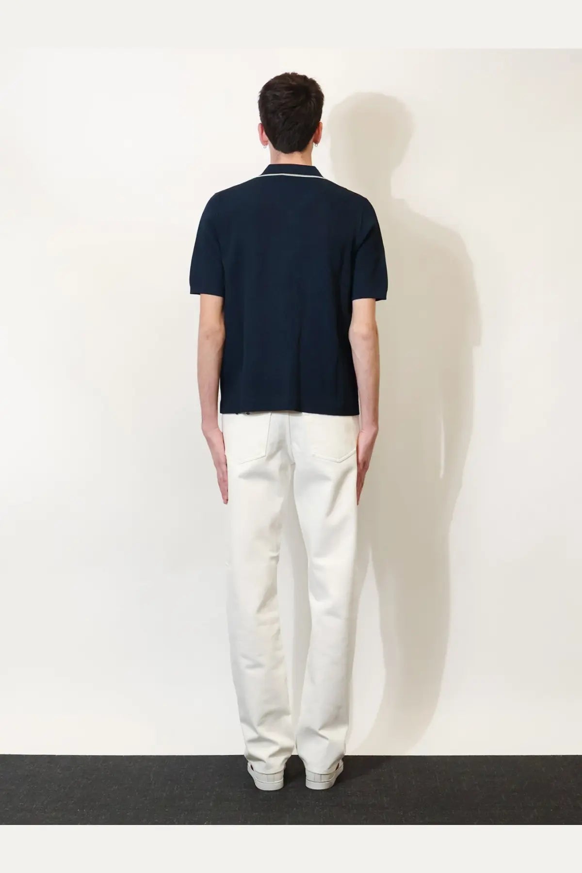 Gucci men’s viscose blend navy blue polo shirt with white trim on collar and short sleeves