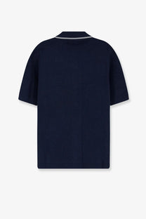 Gucci men’s viscose blend navy blue short-sleeved knit polo shirt with white trim along the collar