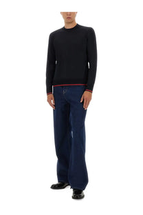 Gucci men’s black long-sleeved sweater with red trim at hem and cuffs in web pattern blue design