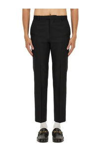 Gucci men’s black wool blend twill pants with tailored fit straight-leg cut and subtle front creasing