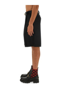 Black gucci men’s wool blend twill shorts with sleek tailored fit and subtle pleats front view