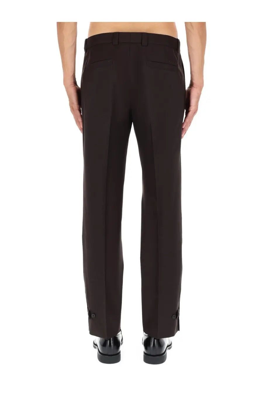 Gucci men’s black wool gabardine pants with tailored fit, sleek straight-leg cut, and subtle side pockets