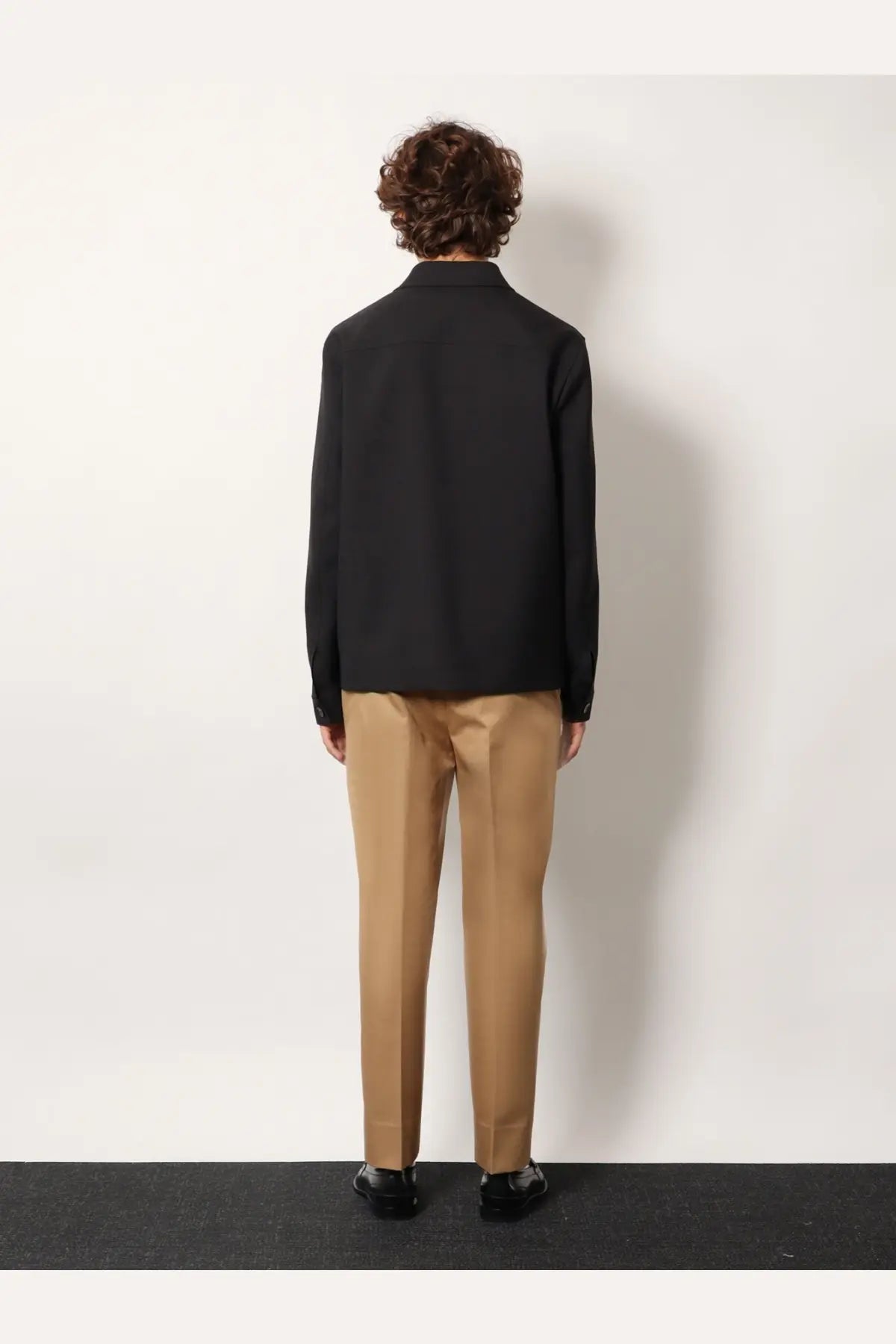 Black tailored wool blazer with classic collar and long sleeves for men by Gucci in grey color