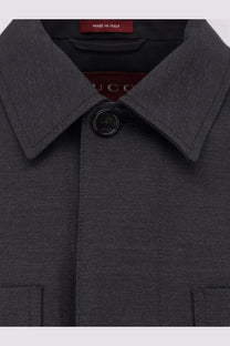 Gucci men’s wool shirt jacket grey in dark gray textured wool with black button and Gucci branding tag
