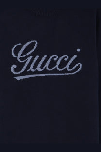 Dark blue Gucci men’s wool sweater featuring a silver-toned knitted logo on the front