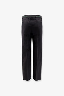 Black tailored wool trousers for men by gucci with sleek straight leg and subtle green stitching on belt loop