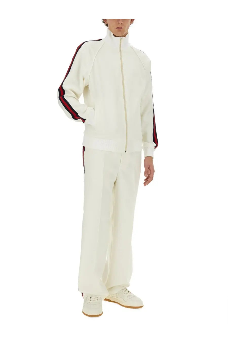 Gucci men’s zippered jacket in cream with red and black striped accents on sleeves and side seams