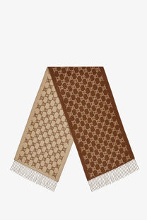 Brown and beige gucci unisex cashmere scarf with interlocking gg logo pattern and fringed edges