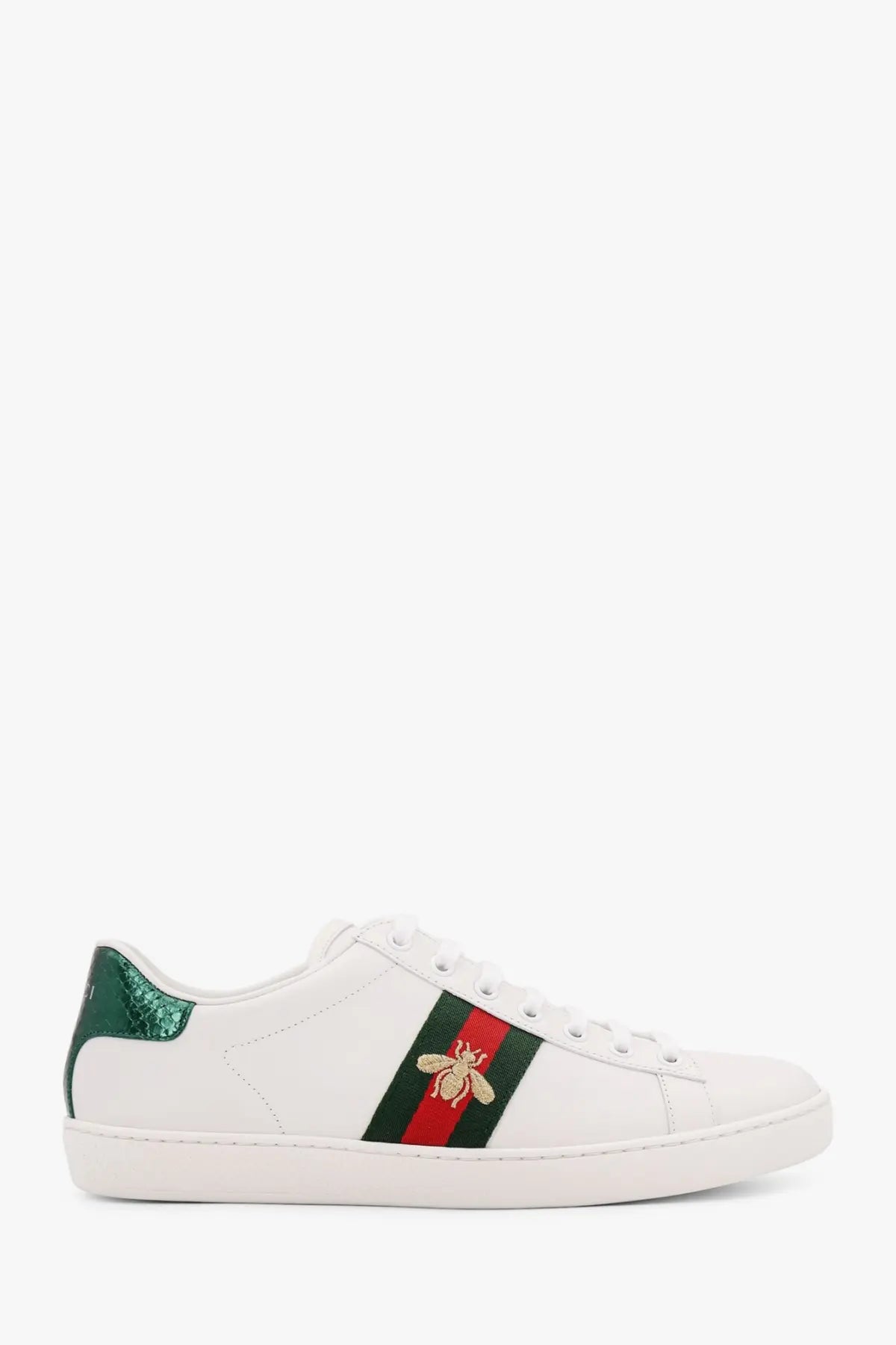 White Gucci women’s Ace leather sneakers with green and red striped band and embroidered bee design on the side