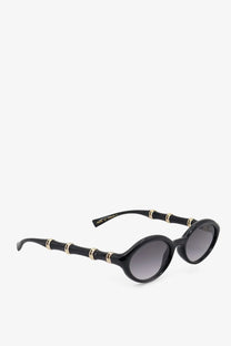 Gucci women’s black acetate sunglasses with black bamboo-inspired frames gold-tone accents and gradient gray lenses