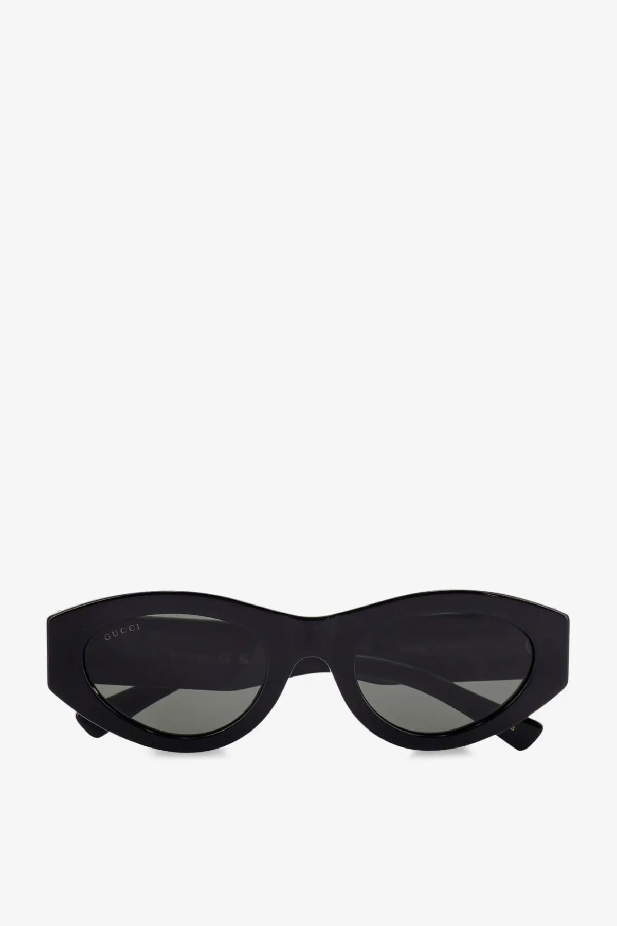 Gucci women’s black acetate cat-eye sunglasses with dark gray lenses and a sleek glossy frame