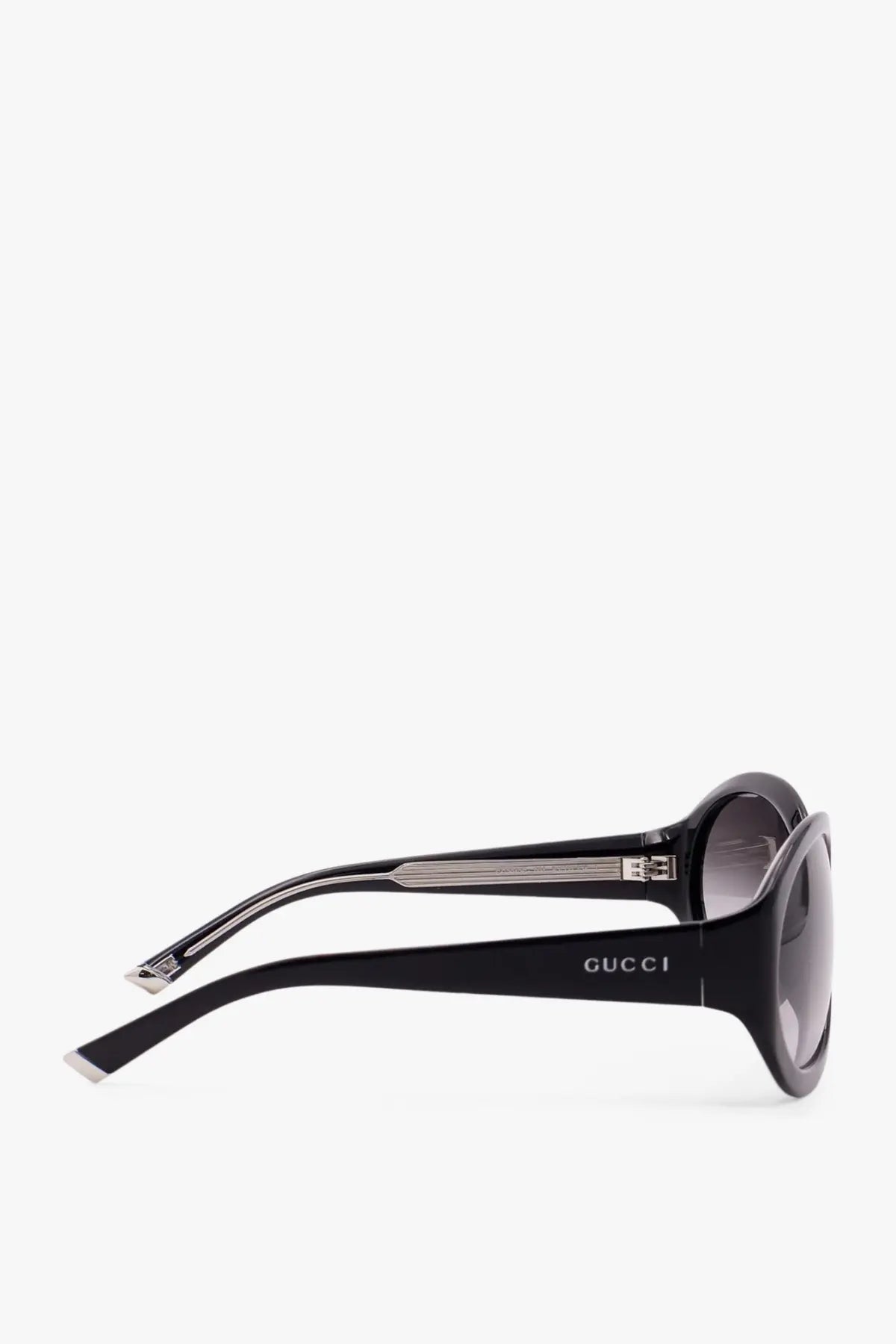 Gucci women’s acetate sunglasses in black with sleek glossy frames and gradient gray lenses