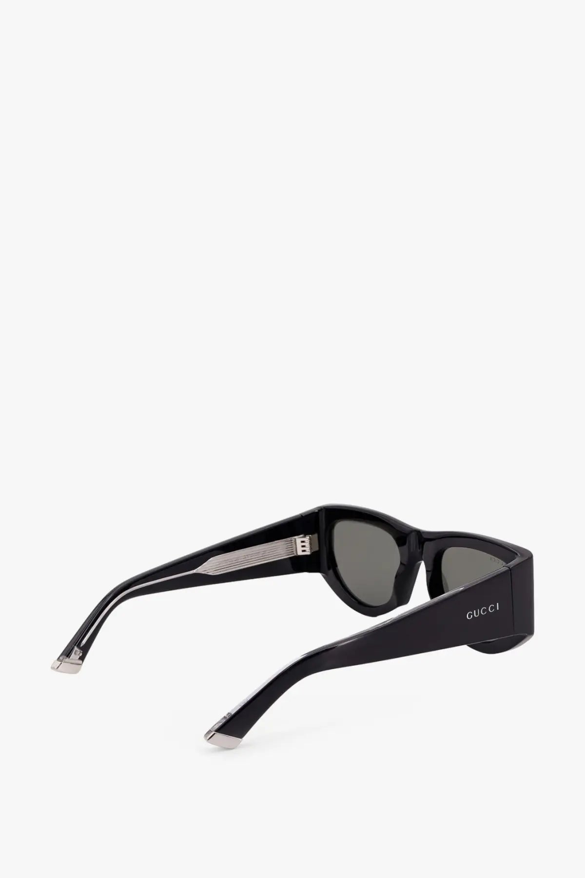 Black gucci women’s acetate sunglasses with sleek modern frames and dark gray lenses for stylish sun protection
