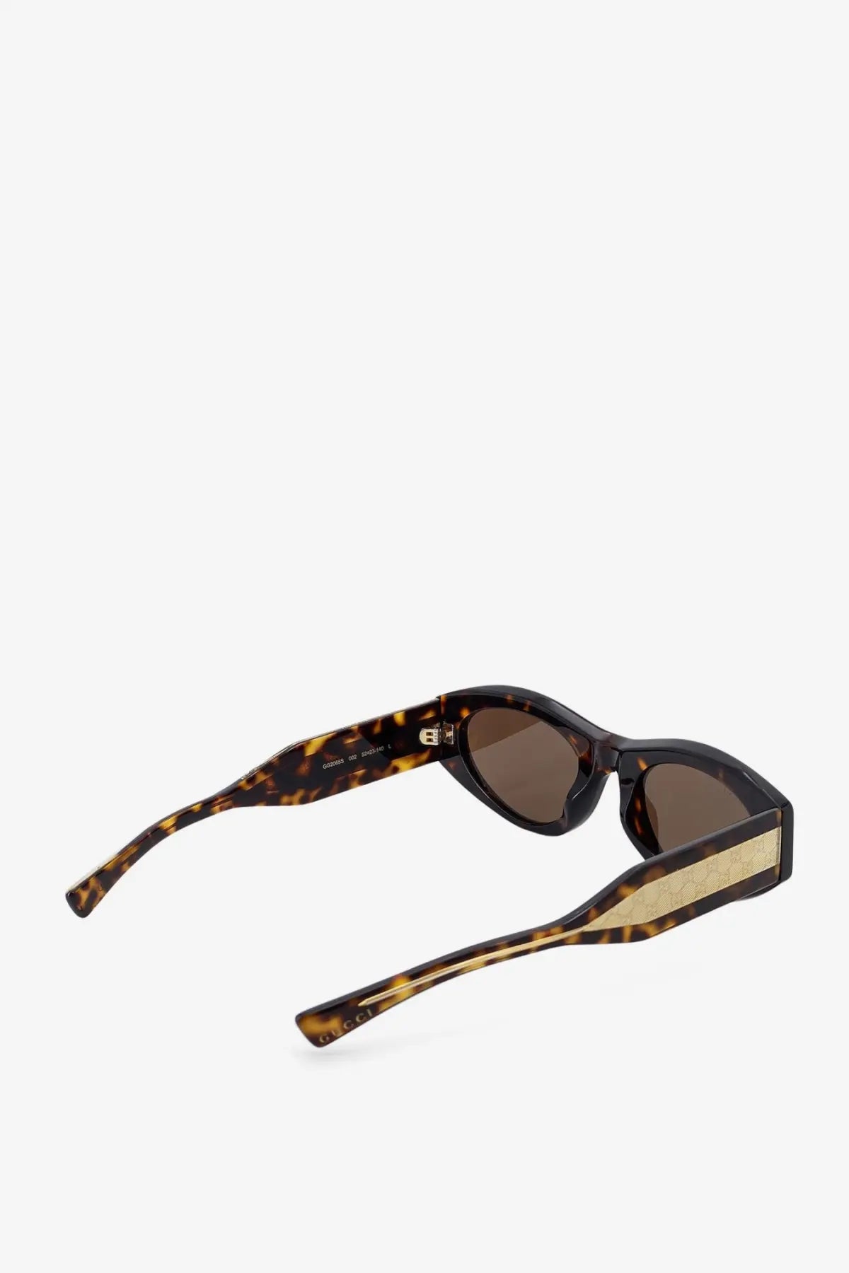Gucci women’s tortoiseshell acetate sunglasses with gold-tone metal detailing and brown lenses