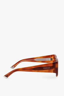 Gucci women’s tortoiseshell acetate rectangular-frame sunglasses with brown lenses and silver metal accents