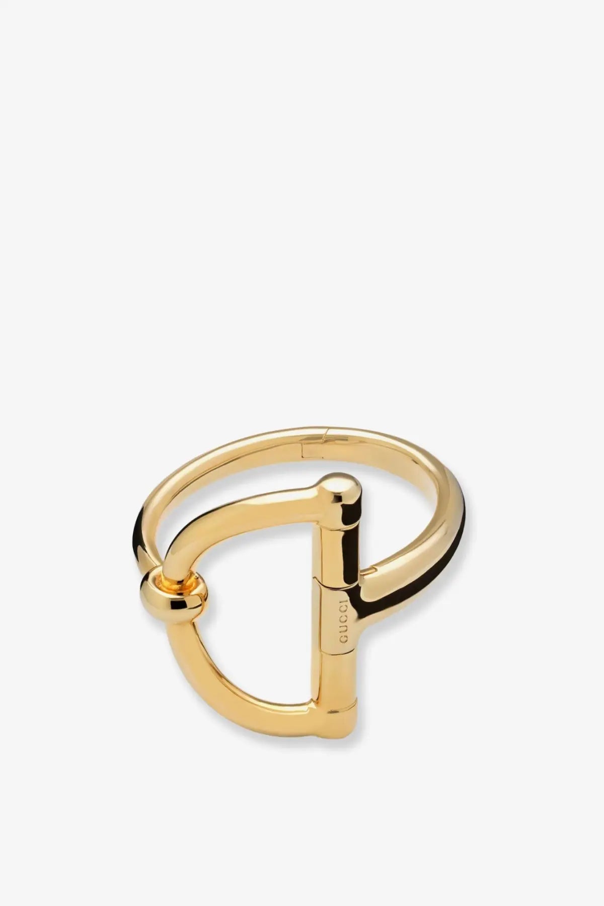 Gold tone Gucci women’s bracelet featuring a polished metal horsebit ring with sleek minimalist design