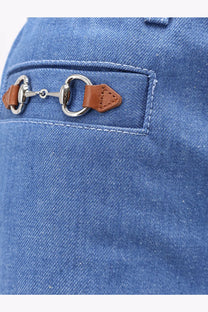 Gucci women’s blue cotton denim jeans with silver horsebit buckle and brown leather accents on front pocket
