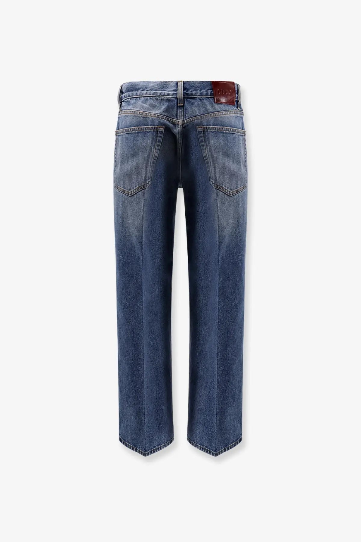 Blue denim Gucci women’s cotton jeans with straight-leg cut and brown leather brand patch at the waistband back side