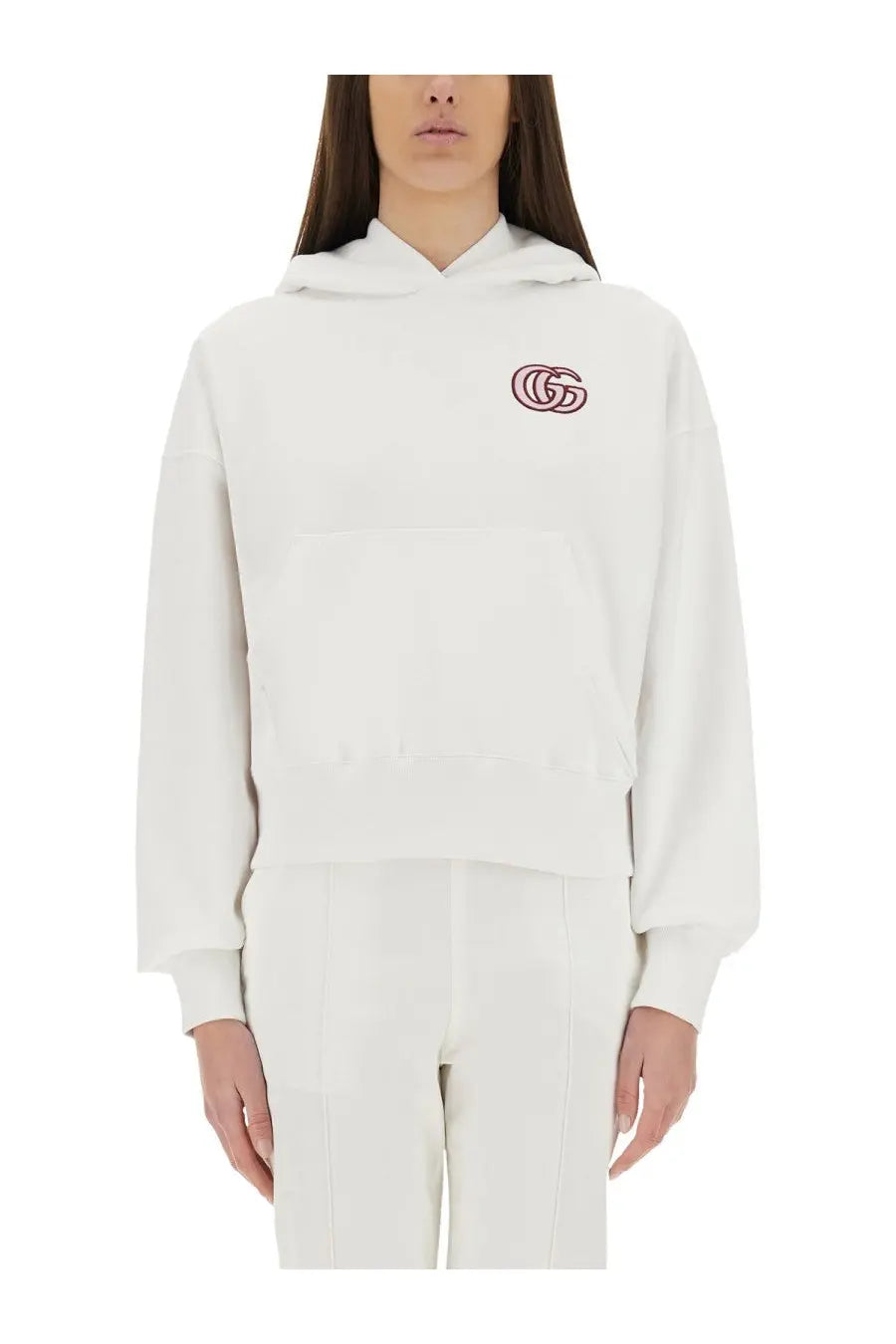 Gucci women’s white cotton sweatshirt with subtle pink embroidered logo on the chest