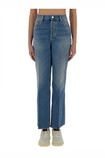Gucci women’s denim pants blue high waisted straight leg medium blue wash denim with subtle fading and classic stitching