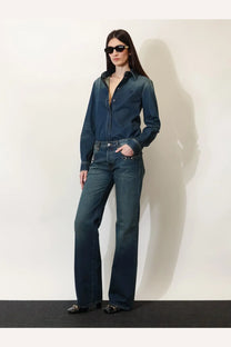 Gucci women’s dark blue denim shirt with button-up front and long sleeves made of denim material