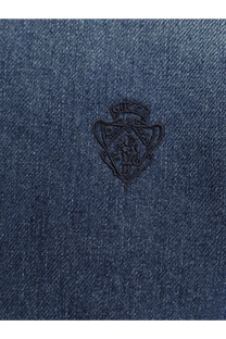 Dark blue denim shirt for women featuring a black embroidered gucci shield logo on the front