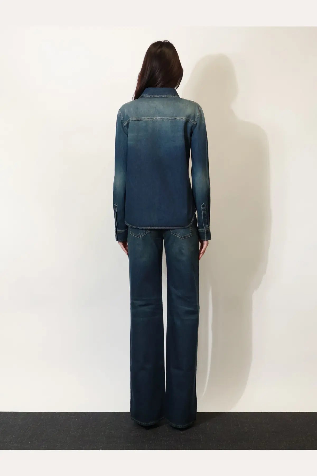 Gucci women’s denim shirt in dark blue with a subtle fade and classic stitching details