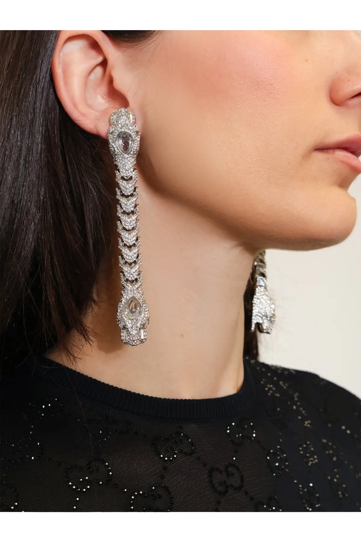 Gucci women’s dionysus silver snake-shaped drop earrings with sparkling crystals and a central dark gemstone