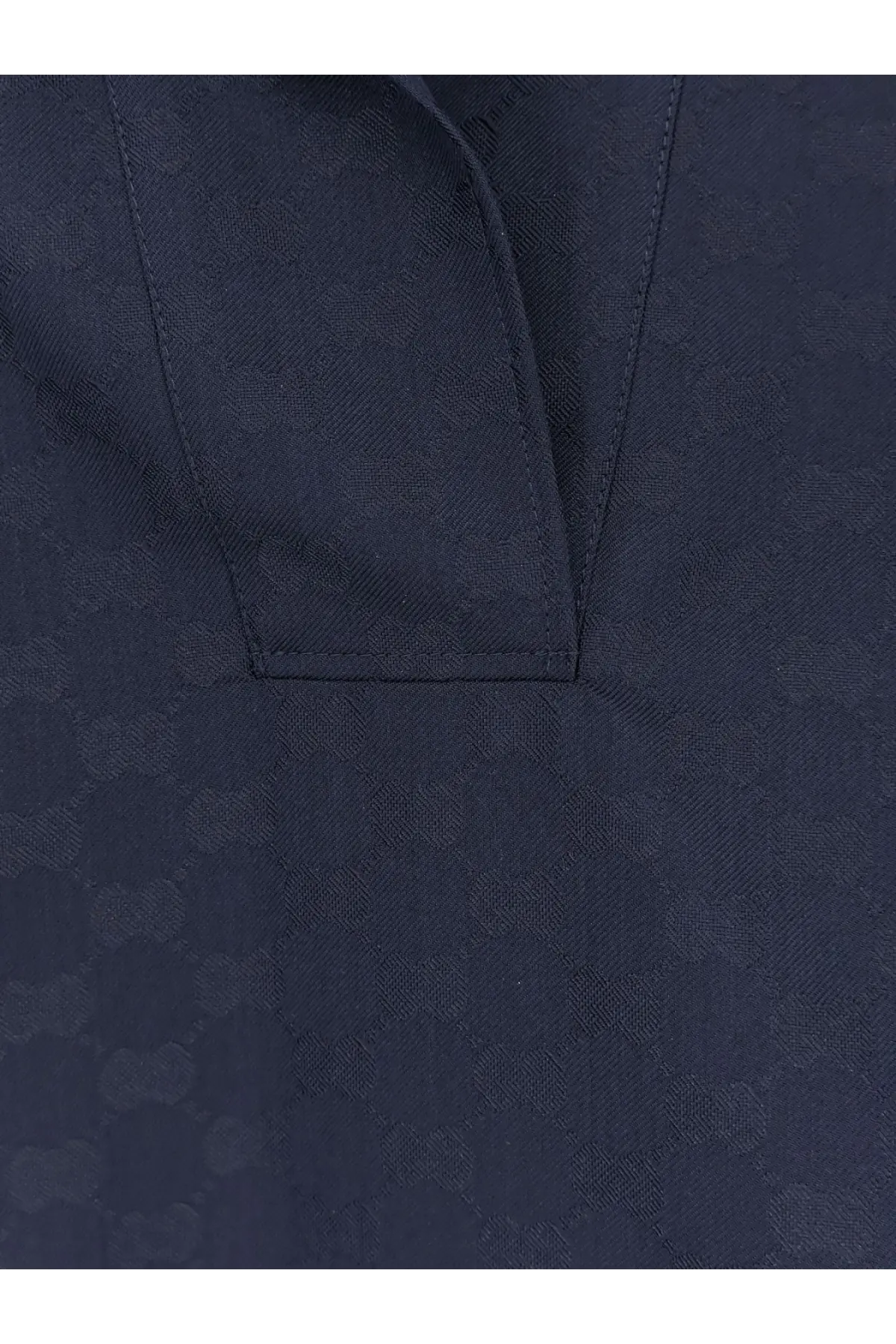 Dark blue gucci women’s fabric polo shirt tide with subtle repeating interlocking g logos pattern