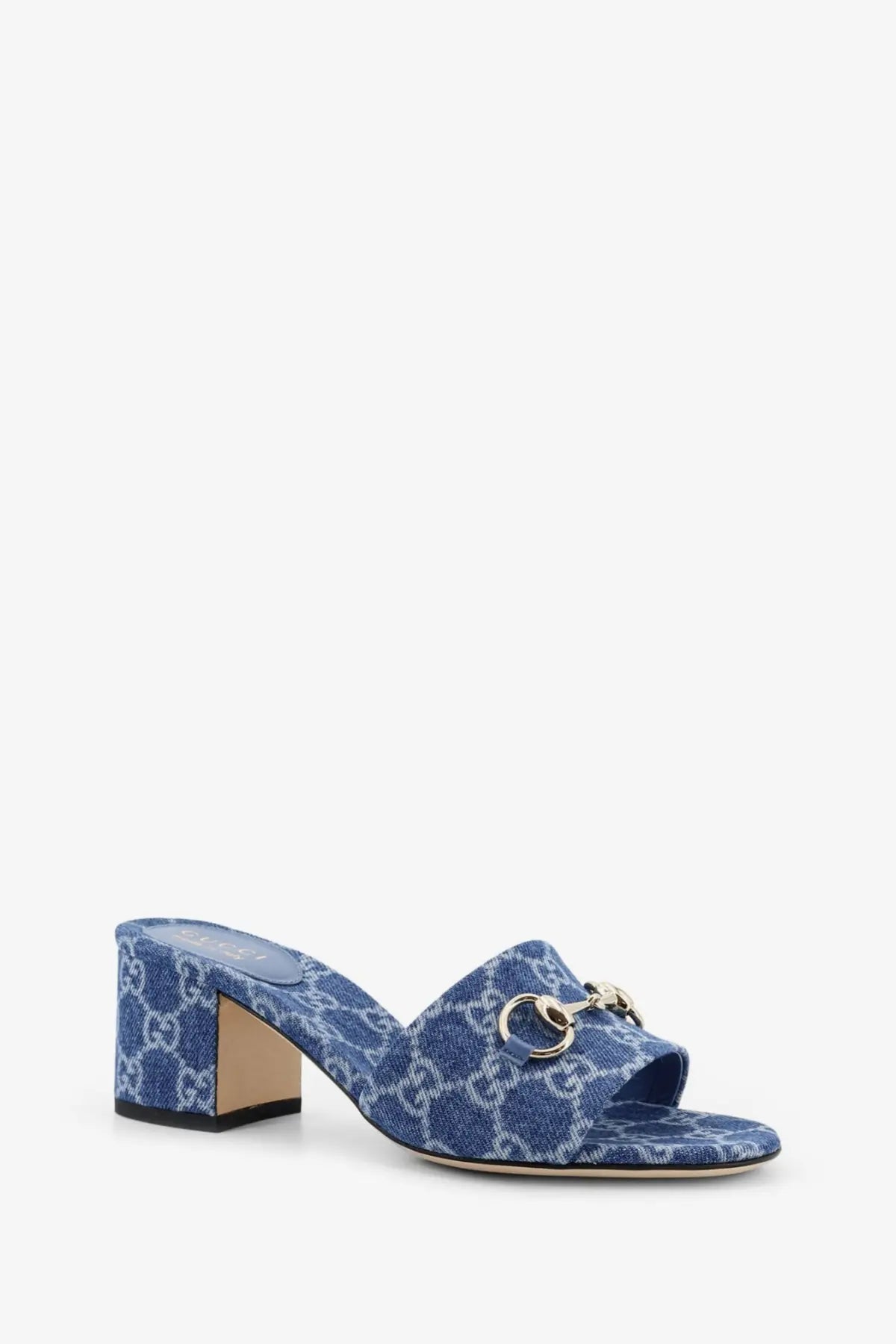 Gucci women’s blue denim sandals with gold-tone horsebit buckle featuring mule design