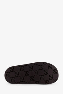 Black gucci slide sandal sole with iconic interlocking gg monogram pattern from gucci women’s gg fabric sabot beige