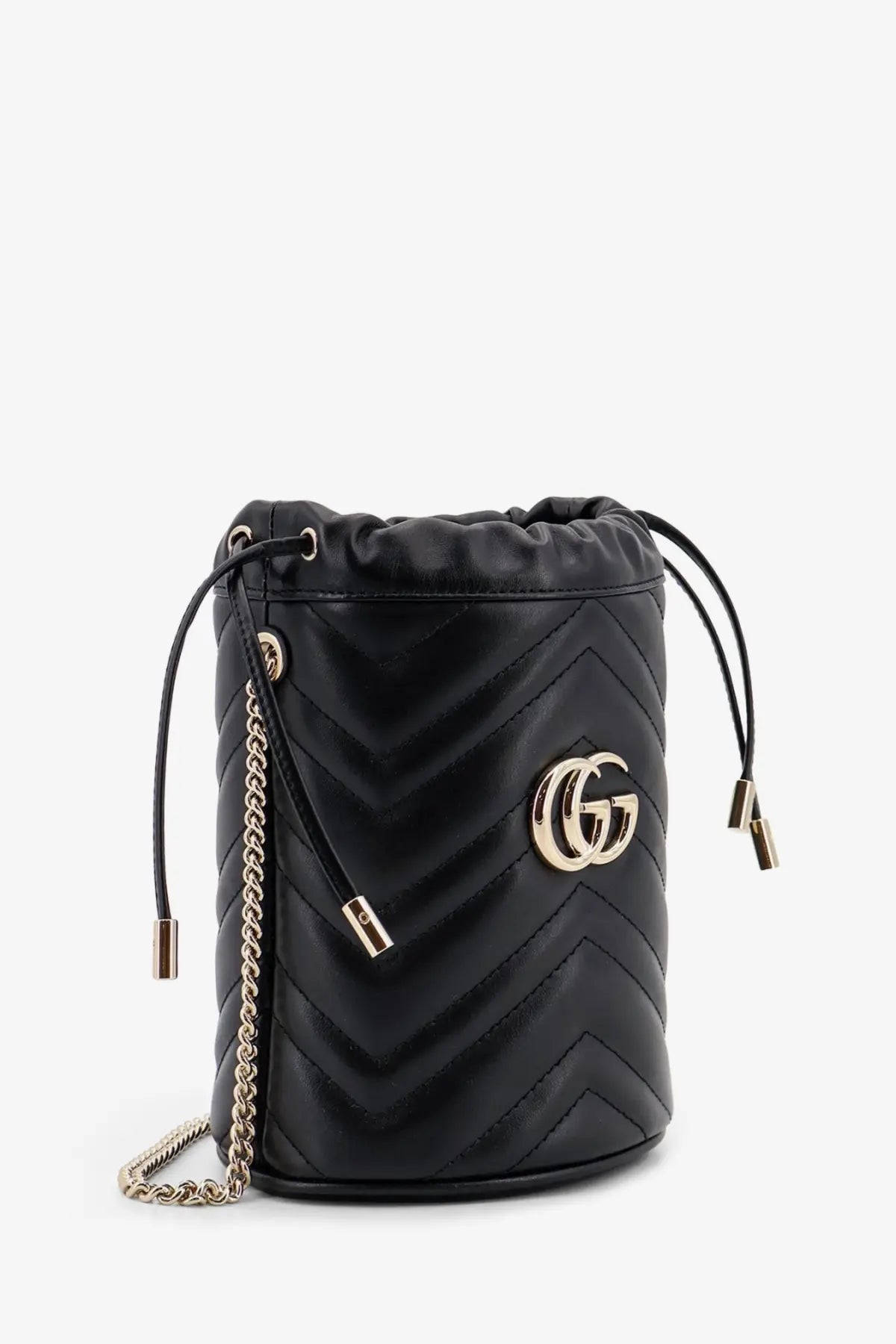 Black quilted leather Gucci women’s GG Marmont bucket bag with gold-tone GG logo and chain strap